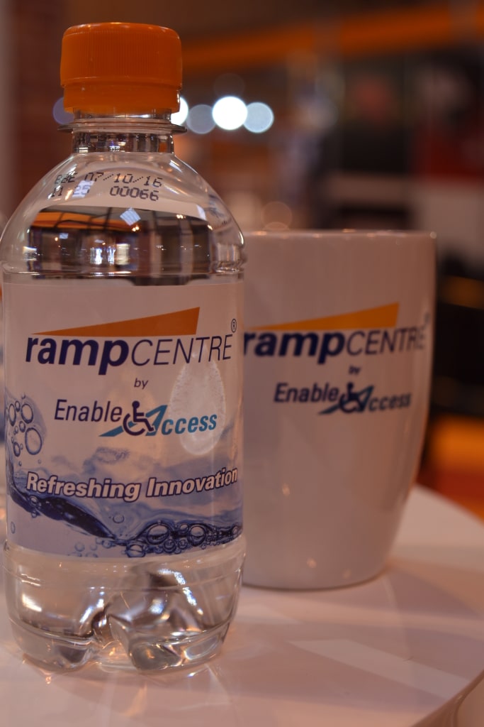 RampCentre by Enable Access branded bottle of water and mug