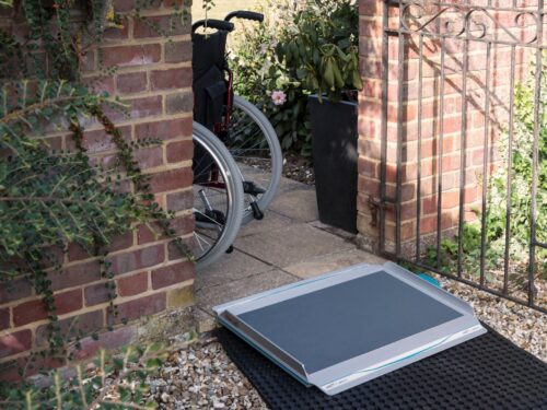 NEW Aerolight-Classic premium non-folding ramp outside on small step with Rollout-Trackway pathway solution leading up to step across gravel