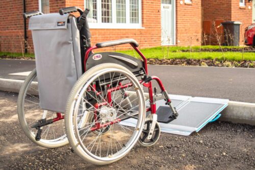 Aerolight Travel Kerb Ramp and bag with wheelchair scaled 1